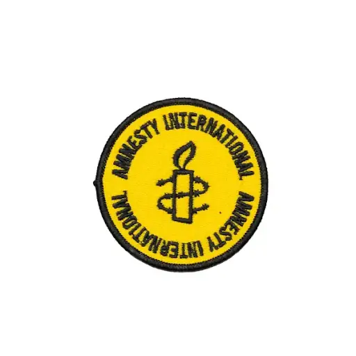 [C2.8.158] Strijkembleem Amnesty International Geel